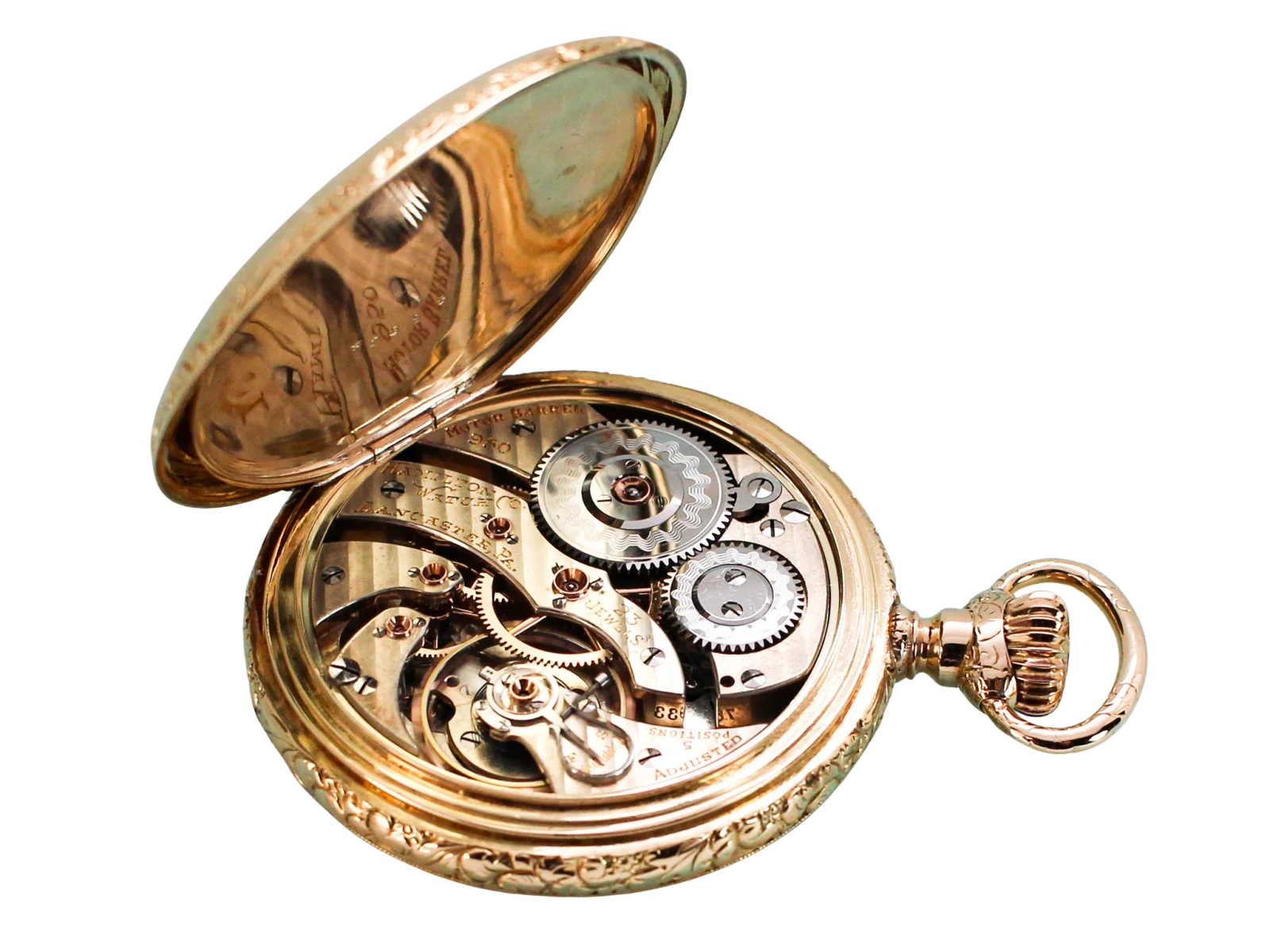 A Hamilton 950 movement in an open hunter case, the maker and grade markings visible on the plate beside the serial number