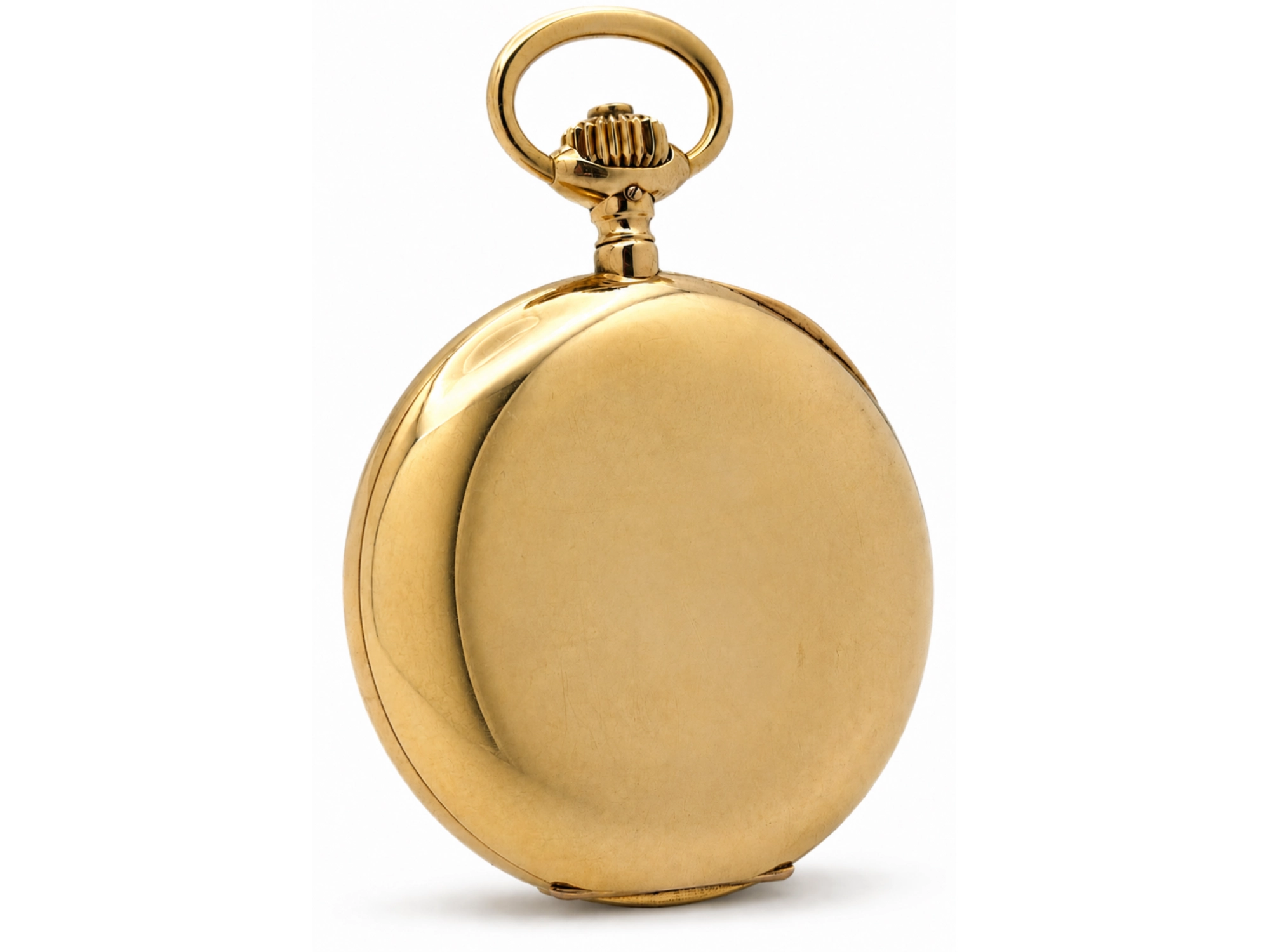 Polished gold-colored hunter case pocket watch with closed back and looped bail.