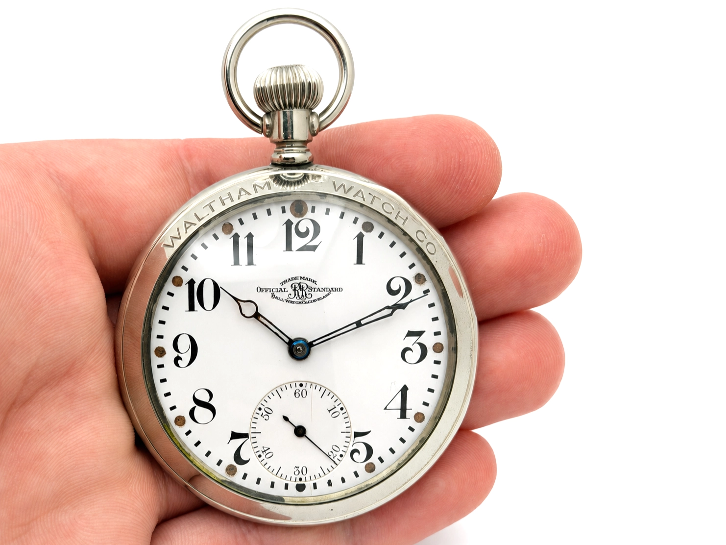 Open-face pocket watch with white dial, Arabic numerals, subsidiary seconds dial, and two-tone hands.