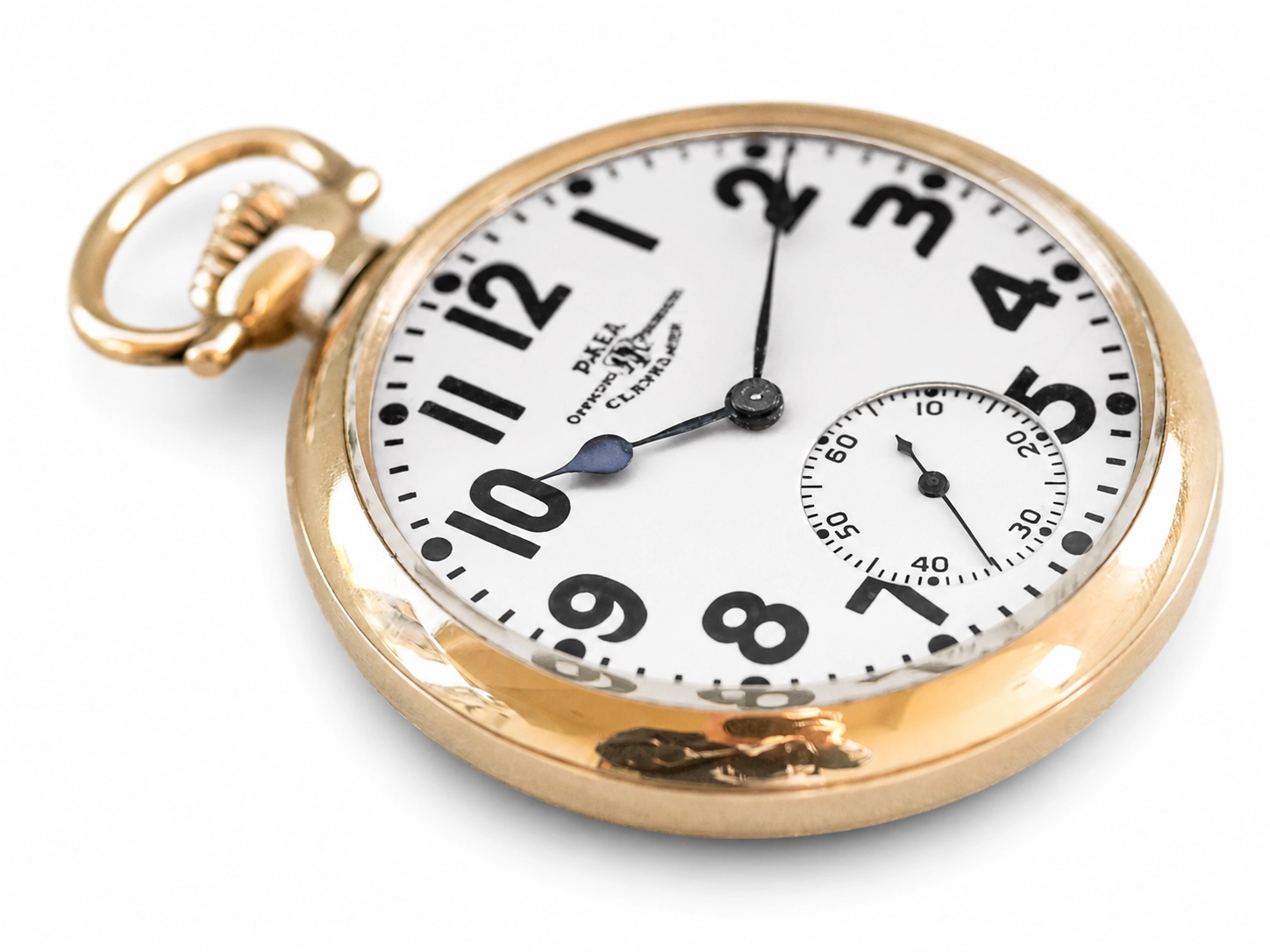 Gold-tone pocket watch with white dial, Arabic numerals, blue hands, and subsidiary seconds dial at 6 o'clock.
