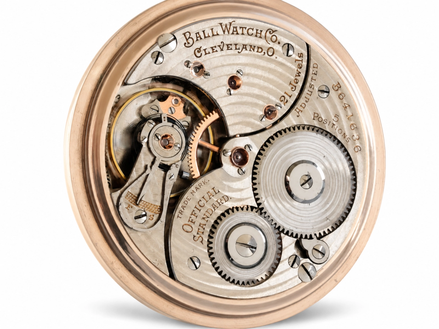 Open movement showing Ball Watch Co. Cleveland dial plate with exposed gears and jewels.