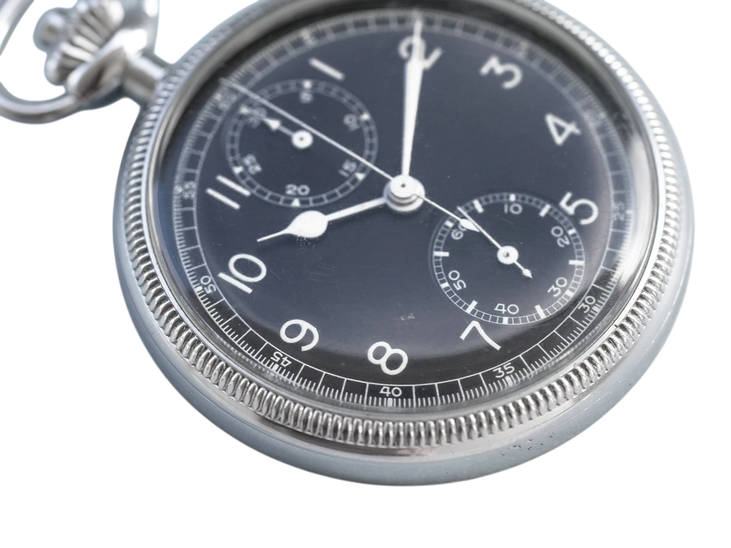 Chronograph pocket watch with dark dial, Arabic numerals, two subdials, and white hands.