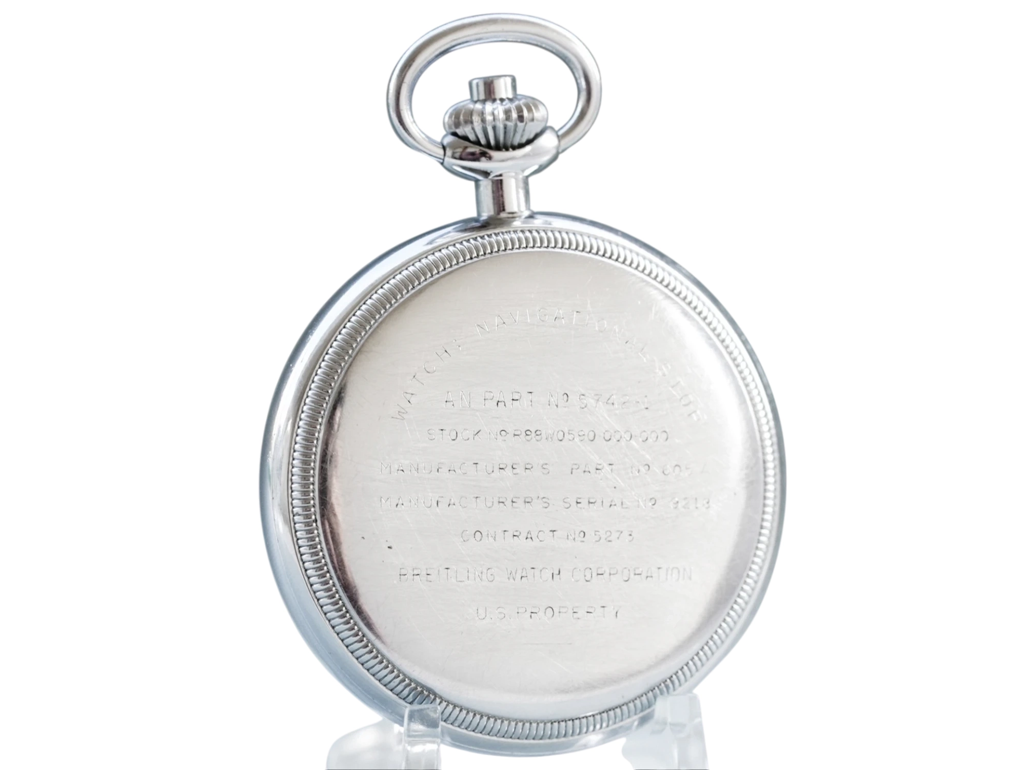 Engraved case back with military contract markings and U.S. Property notation.