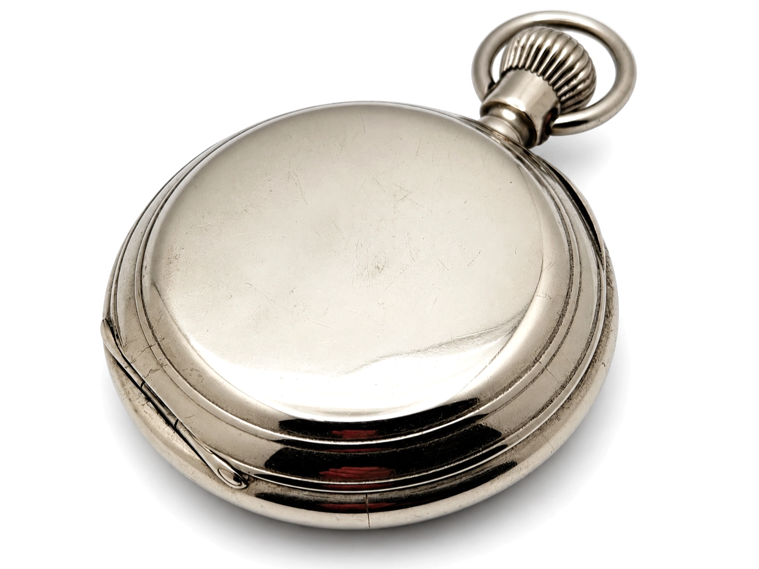 Swiss Cross Beguelin Inner Display Back (1890) — smooth closed caseback with surface wear and patina, polished bezel edge, articulated bow…