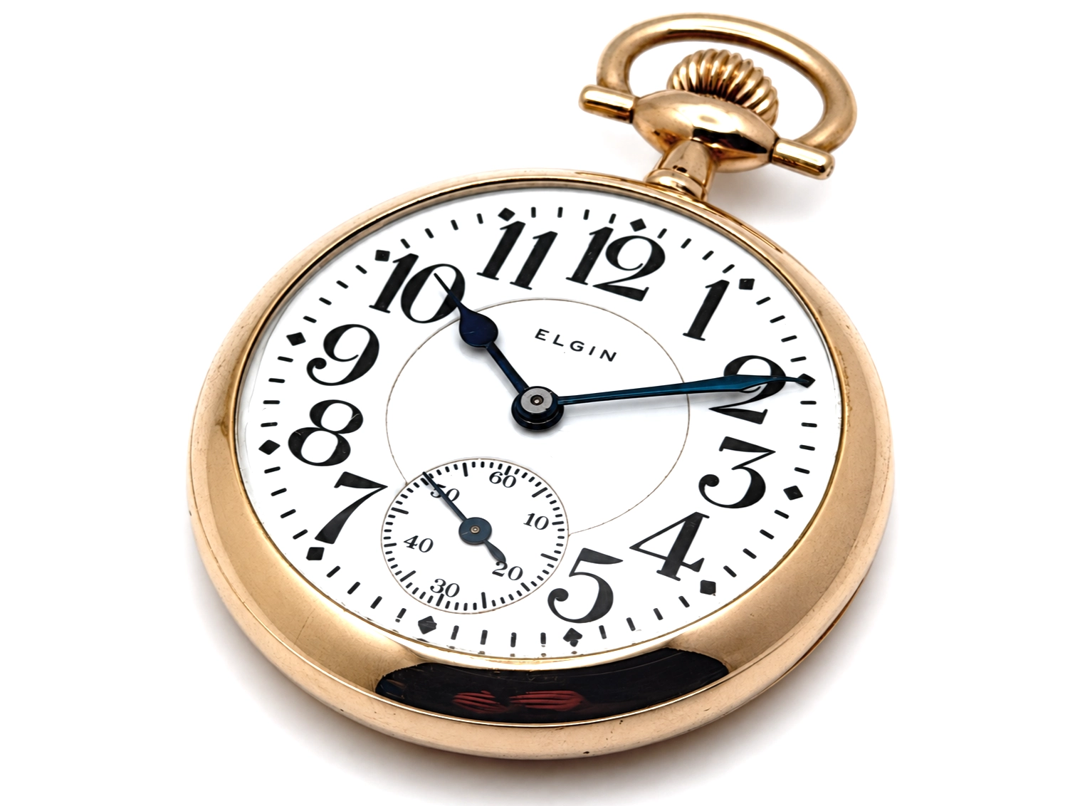 Elgin Father Time Grade 388 — front view of watch with white enamel dial, Arabic numerals, subsidiary seconds dial at 6 o'clock, black…