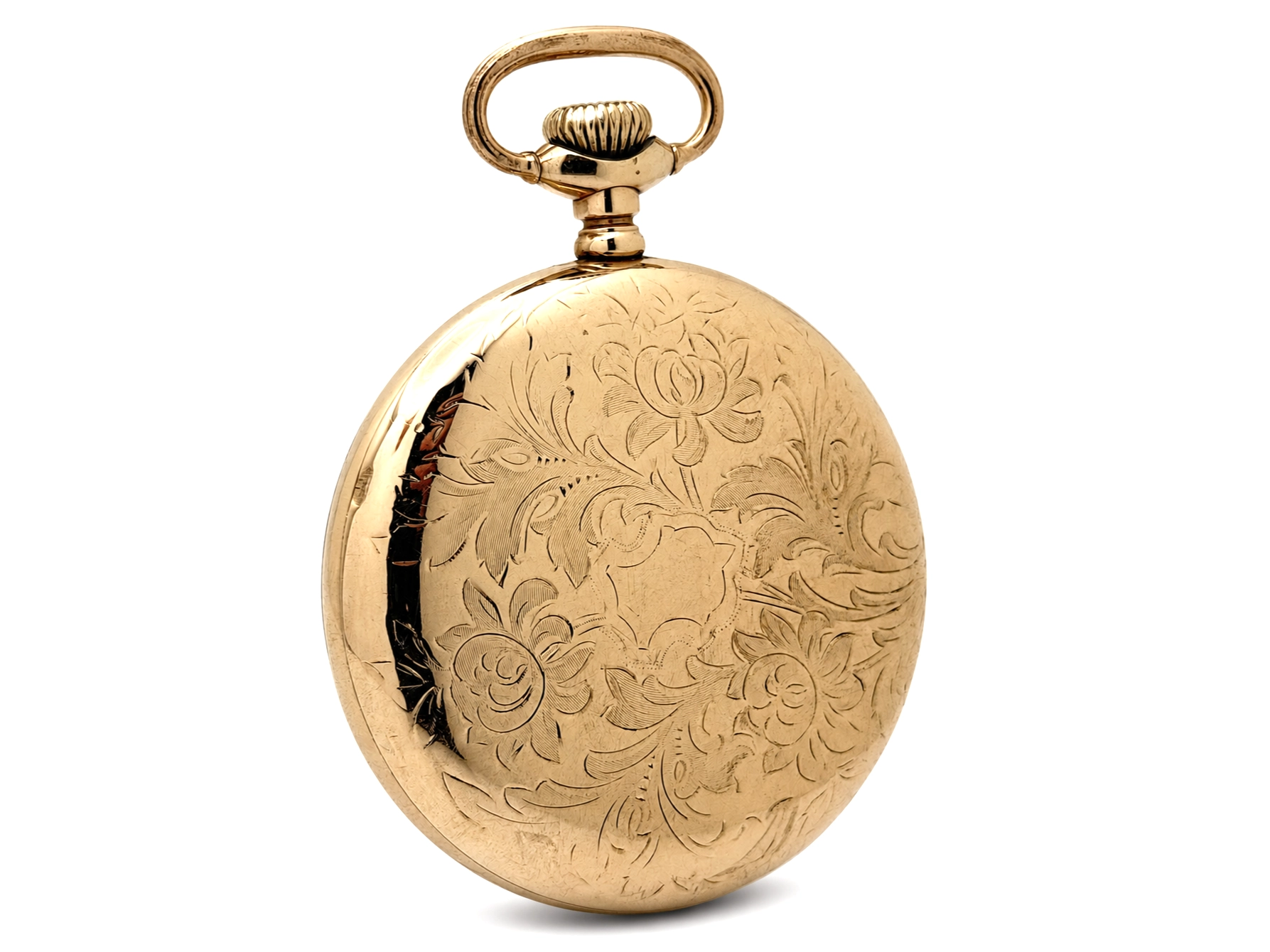 Elgin Veritas 453 Up/Down Wind (1920) — closed gold case front with ornate engraved floral and scrollwork pattern, loop crown visible at top