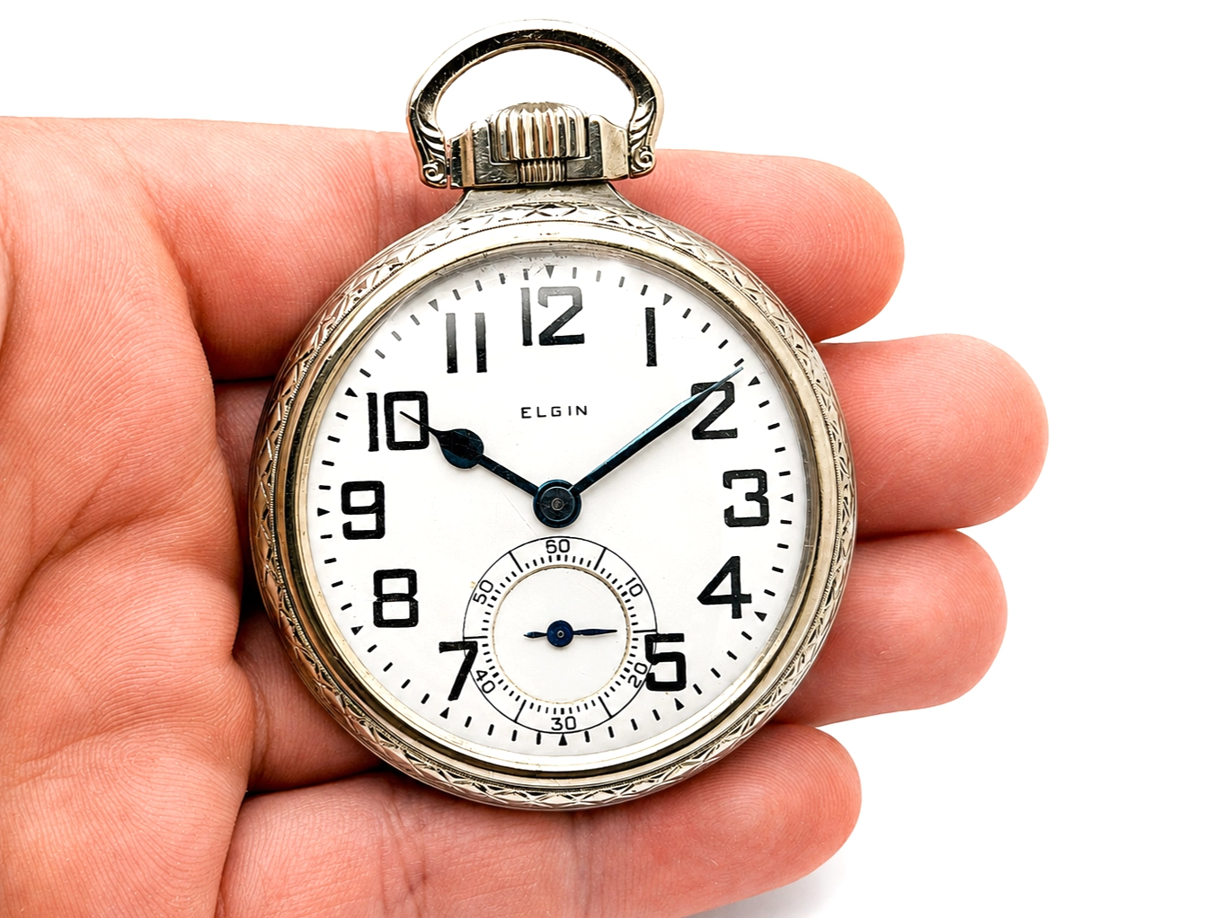 Elgin B.W. Raymond Grade 478 (1926) — front dial with Arabic numerals, subsidiary seconds dial, and textured silver case with bail
