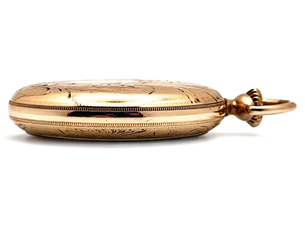 Elgin Father Time 374 with Up/Down Wind Indicator (1917) — closed yellow gold-filled case shown from back, smooth surface with light…