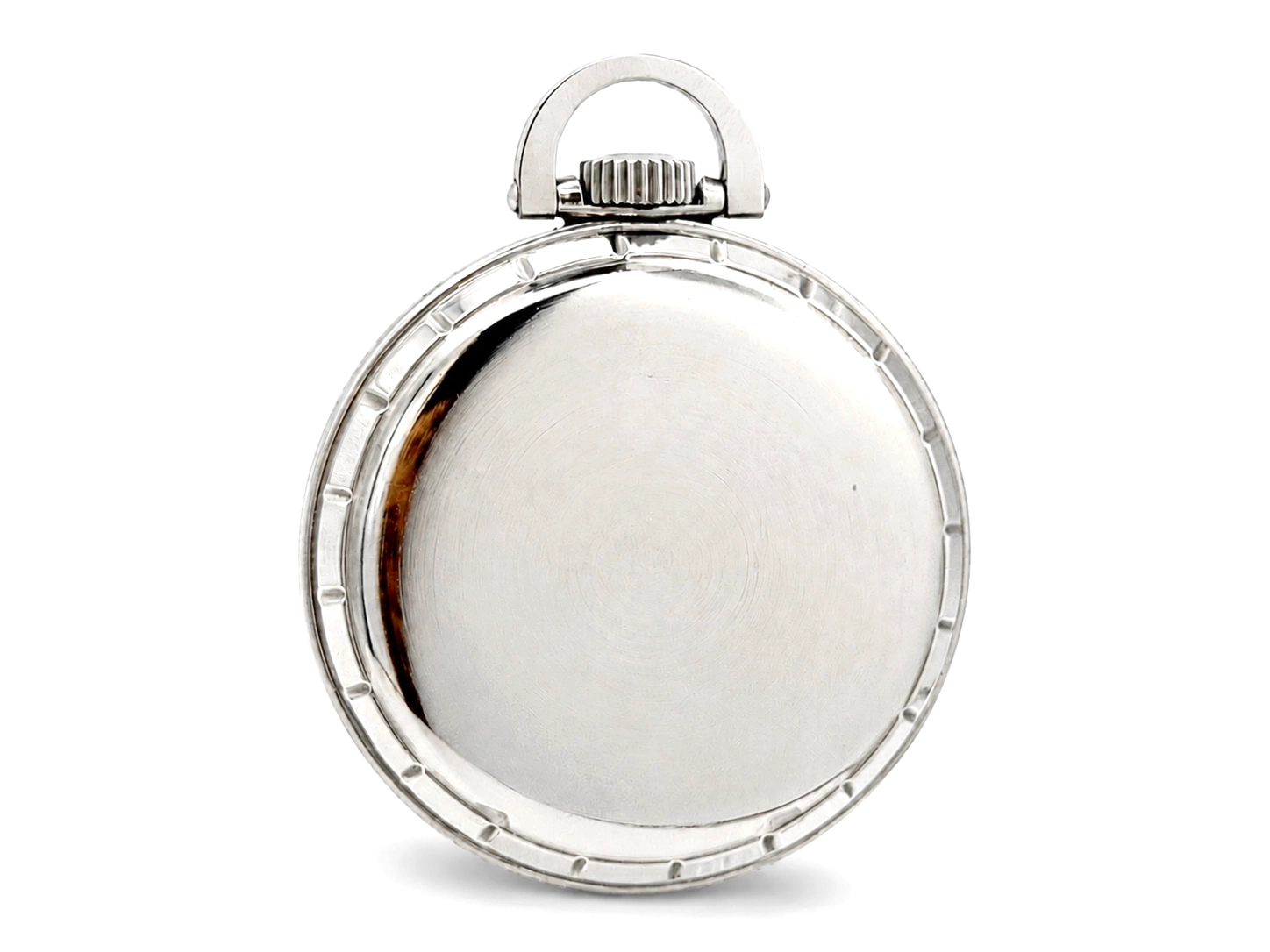 Closed polished silver pocket watch case with bow handle and plain brushed case back.