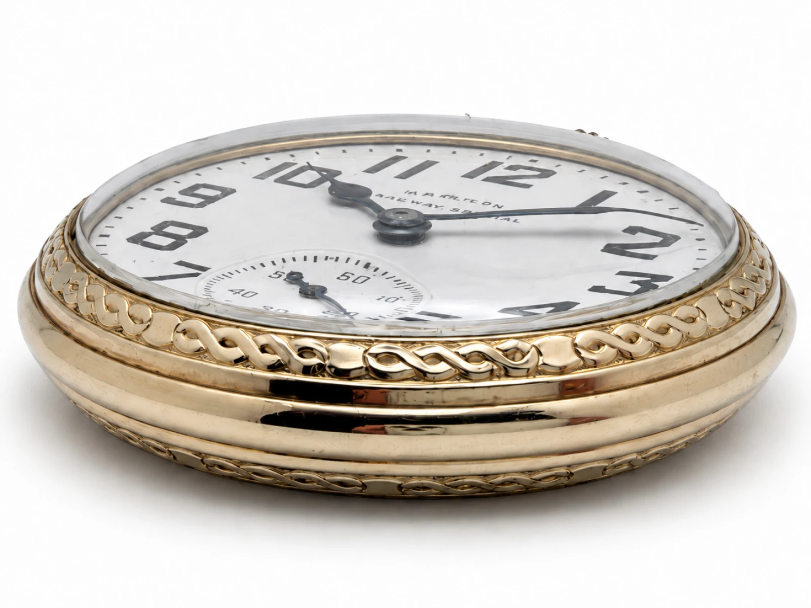 Hamilton 992B in Model 17 Case with Mauve Box (1961) — side view of the raised crystal and engraved bezel