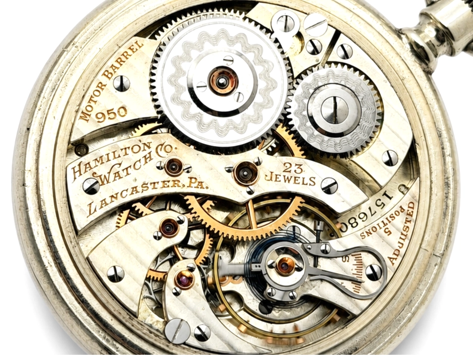 Hamilton 950 Salesman Display Case (1922) — open movement with decorated gear wheels, jewel settings, and brass components visible