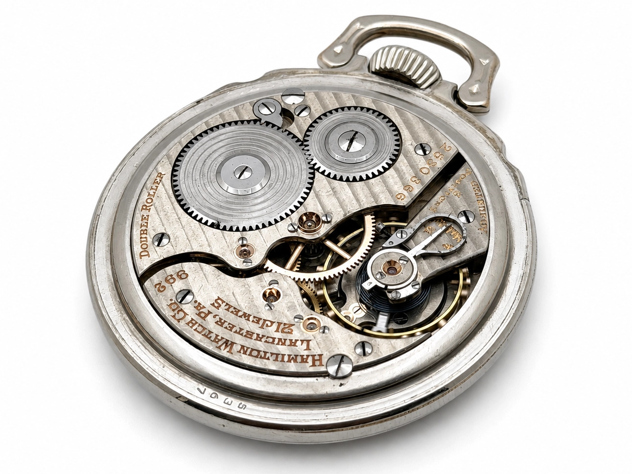 Hamilton 992 (1929) — open movement with gear train, balance wheel, and jeweled settings visible on decorated plates
