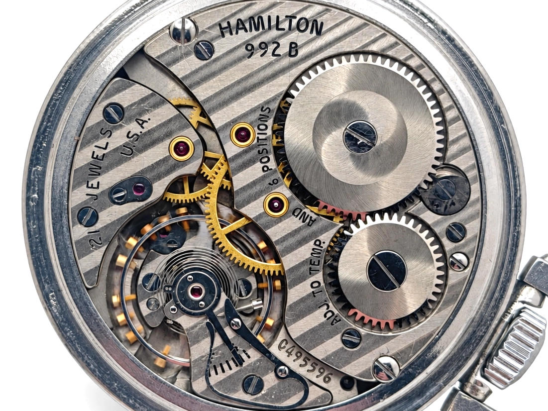 Late-Era Hamilton 992B in Stainless Steel Case (1965) — open movement with Geneva damaskeening, jeweled balance wheel, and gold-accented…