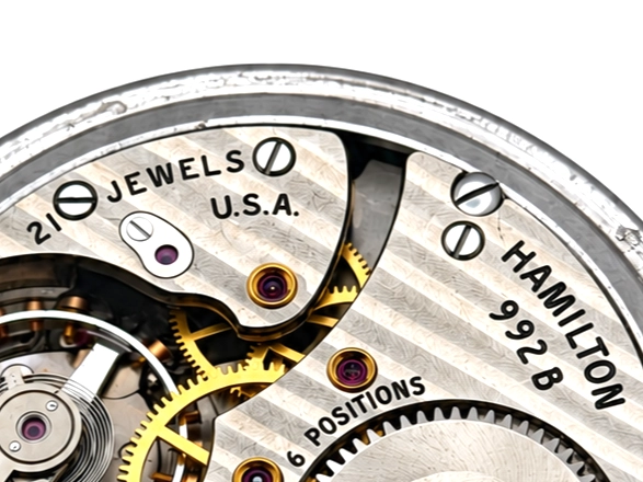 Late-Era Hamilton 992B in Stainless Steel Case (1965) — open movement with decorated main plate, visible jewels, and exposed gear train…