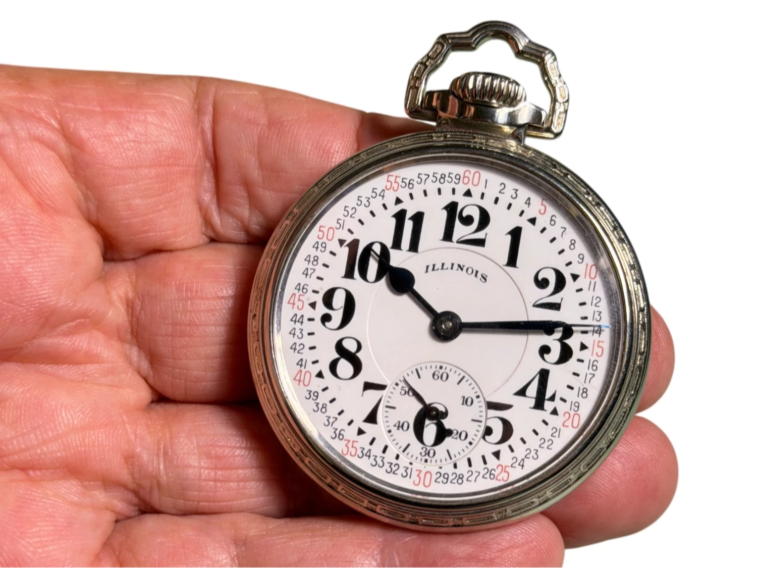Illinois pocket watch with white dial, Arabic numerals, and subsidiary seconds dial in hand.