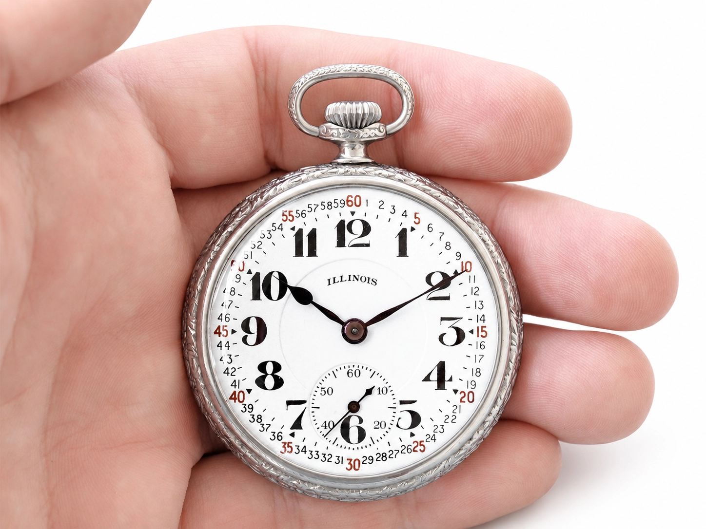 Illinois pocket watch with white dial, Arabic numerals, and subsidiary seconds dial in hand.