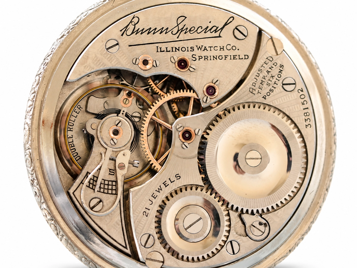 Open movement showing gears, balance wheel, and 21-jewel mechanism with "Bunn Special" Illinois Watch Co. Springfield marking.