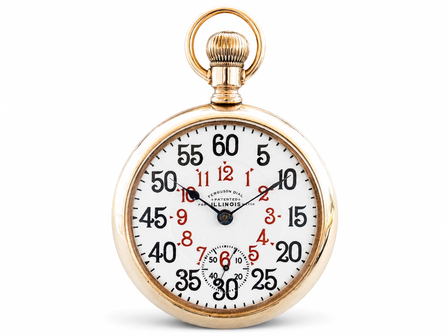 Gold-tone pocket watch with two-tone dial showing chronograph subdial and bold numerals in black and red.