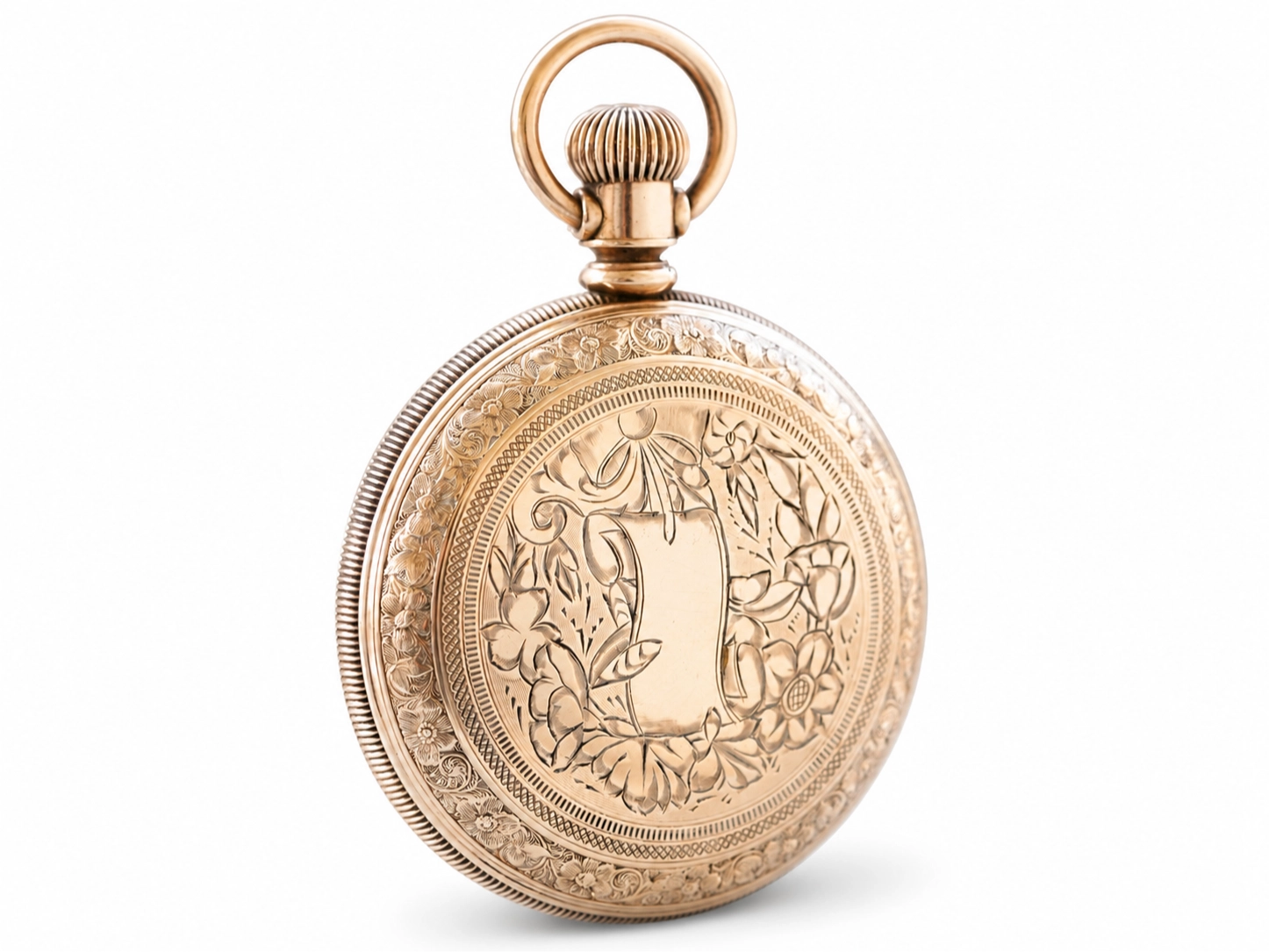 Gold pocket watch case back with ornate floral engraving and decorative borders.
