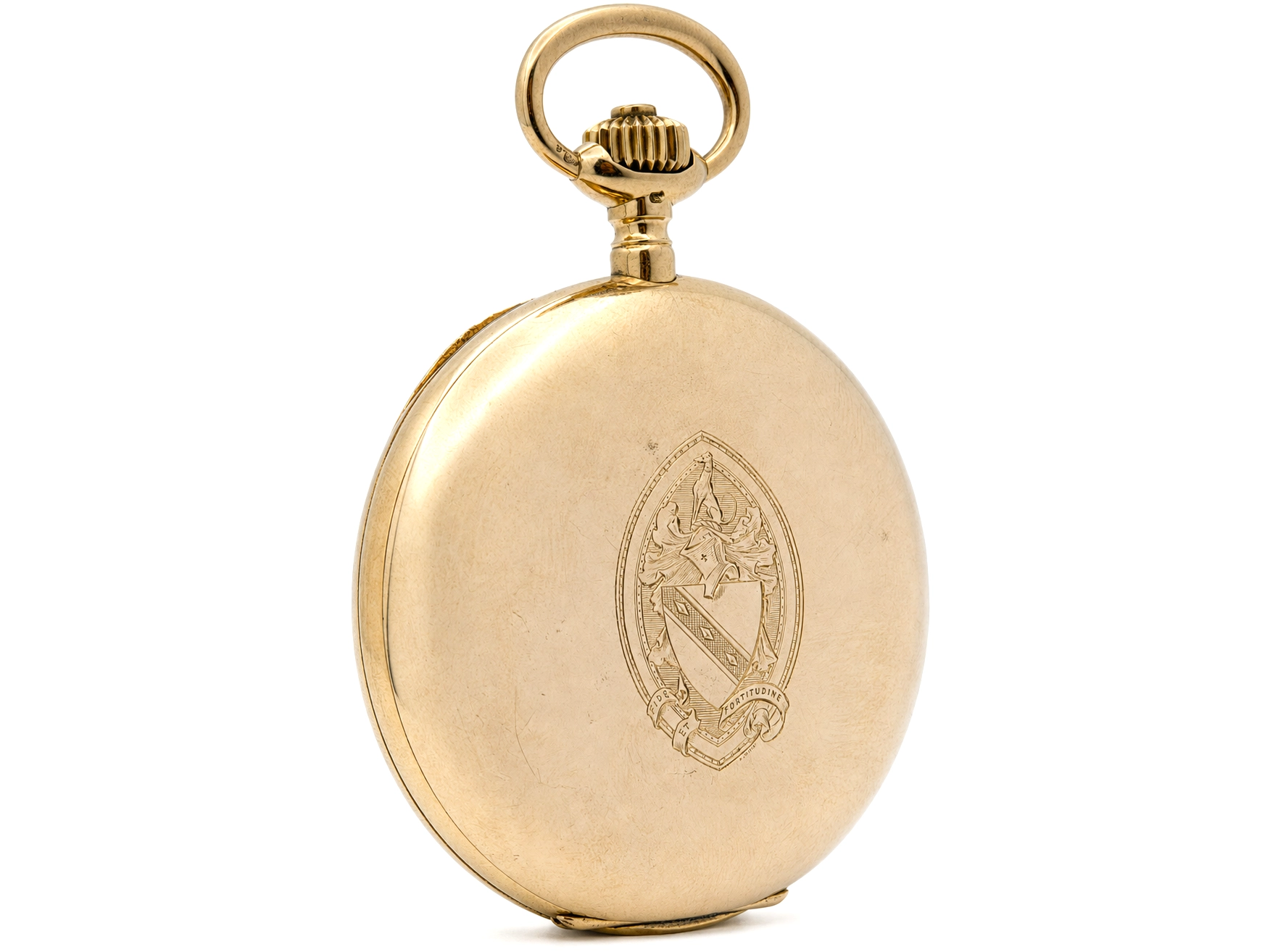 Gold pocket watch case with ornate shield engraving and suspension loop at top.