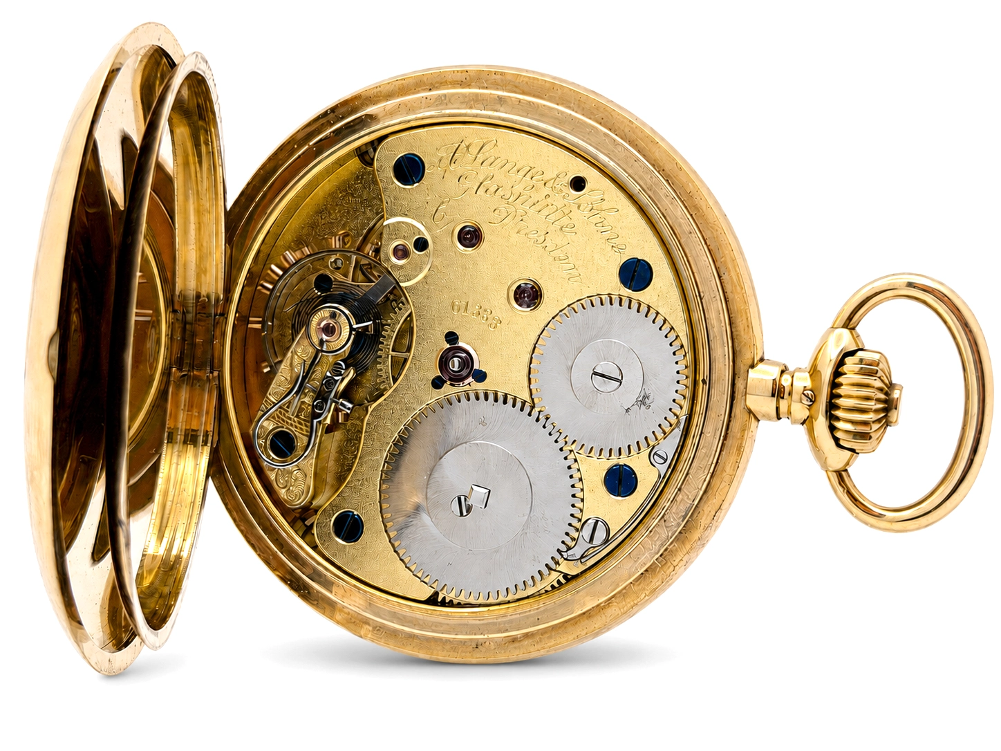 Open-face pocket watch movement showing brass plate, steel gears, jewels, and metal balance wheel.