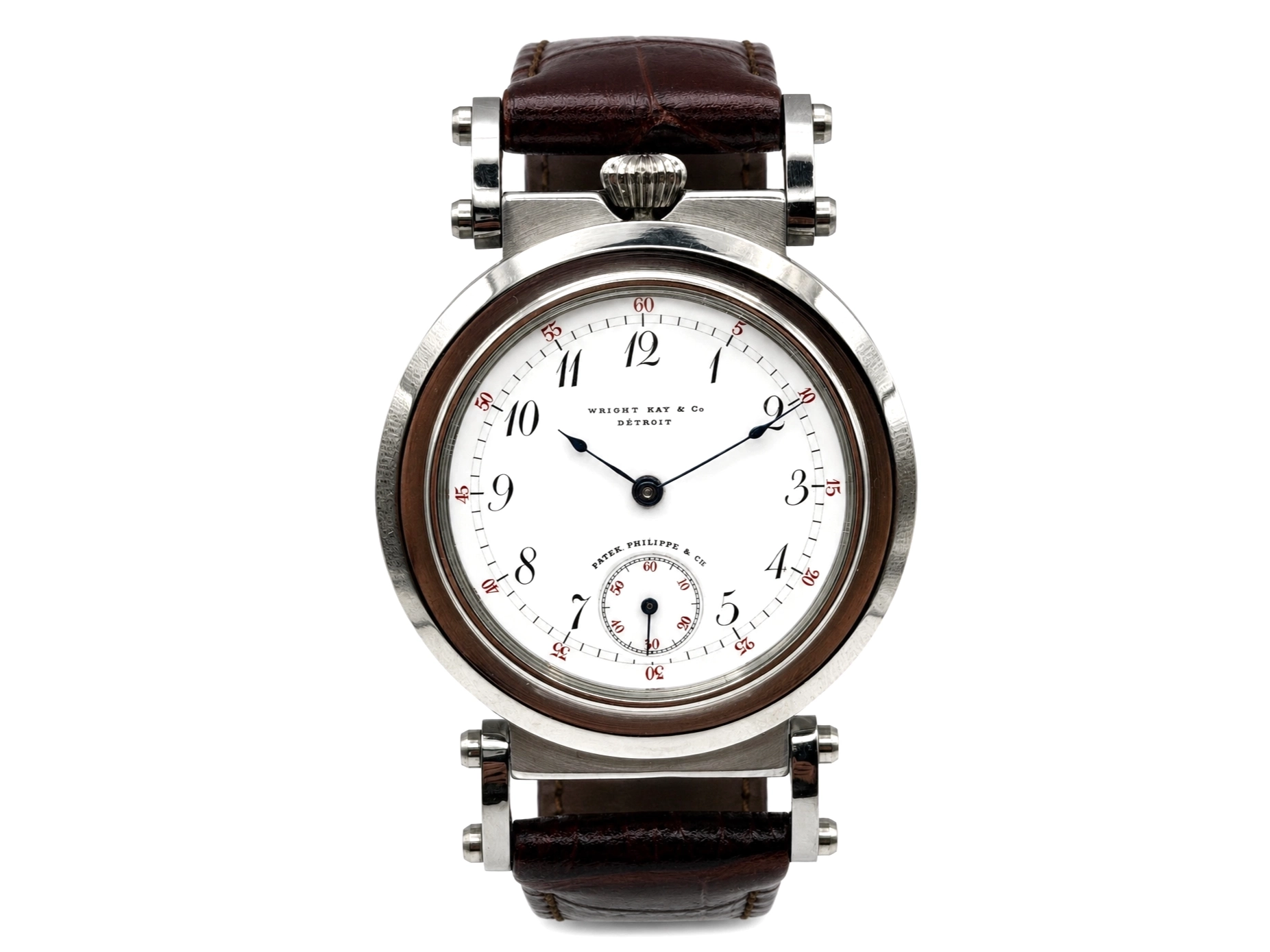 White dial with Arabic numerals, small seconds subdial, maker's marks, on leather strap.