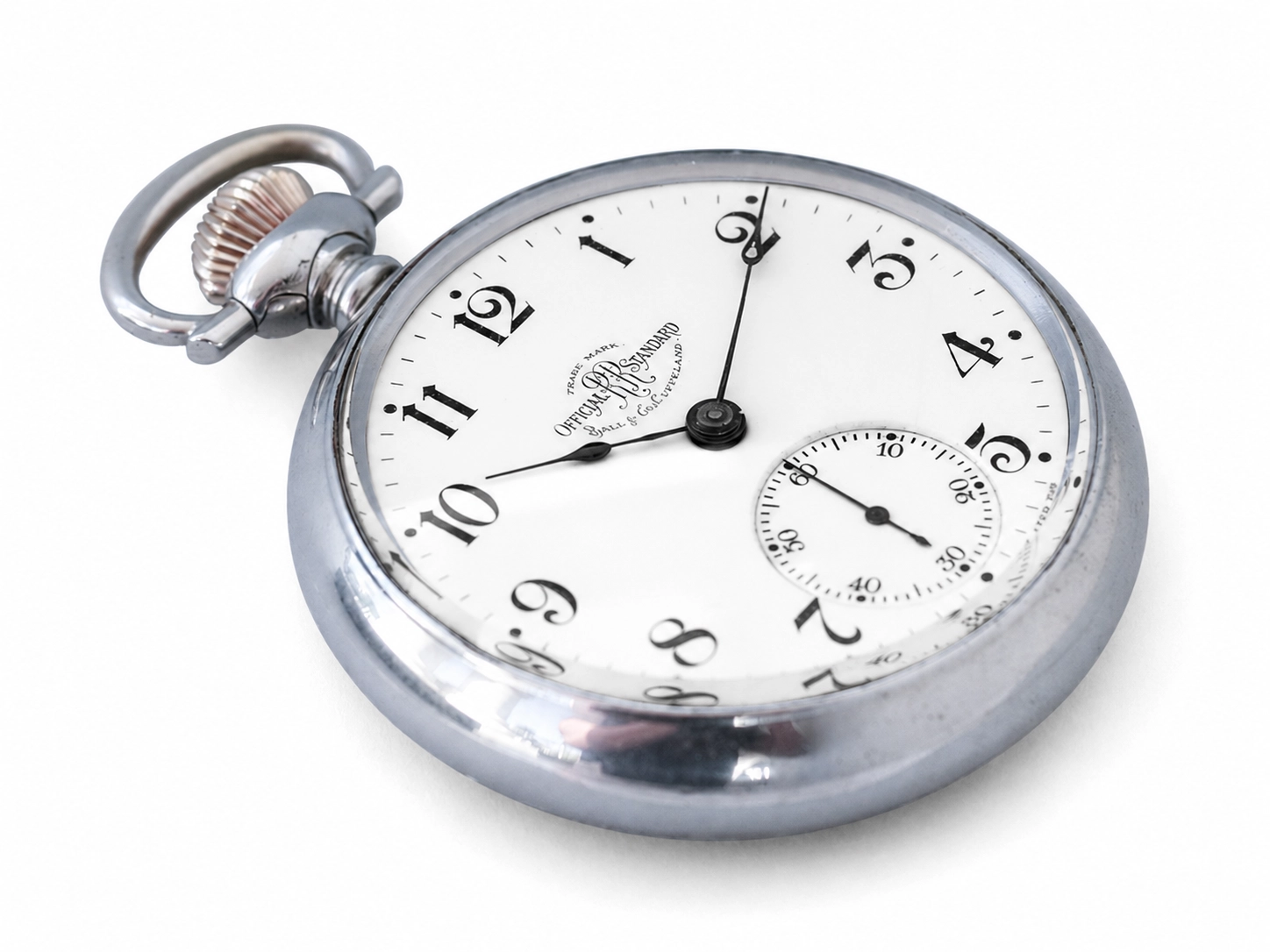 Silver pocket watch with white dial, Arabic numerals, subsidiary seconds subdial, and ornate bow at top.