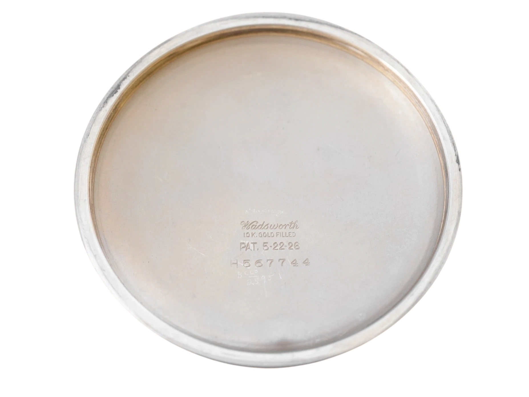 Polished case back engraved with "Wadsworth 19K Gold Filled" text and serial number markings.