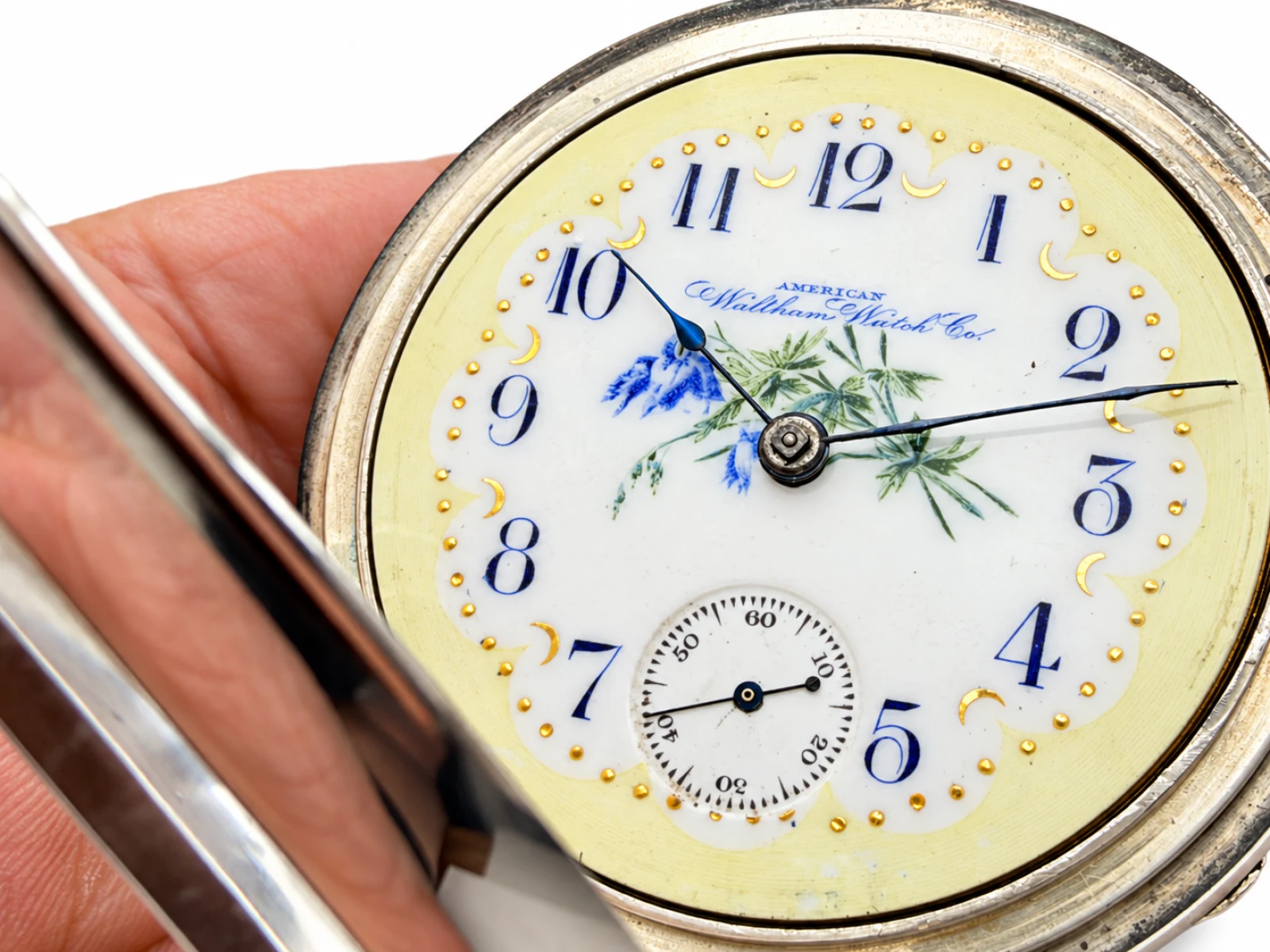 Waltham P.S. Bartlett Key Wind Fancy Dial (1878) — close view of the fancy dial with its cream border, gilt ornaments and floral center