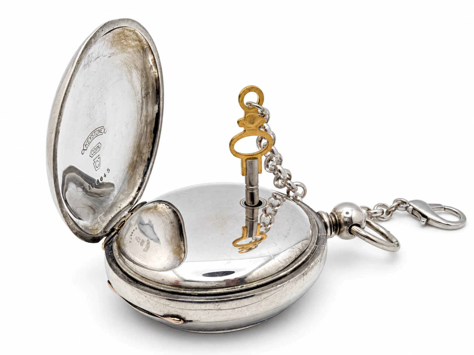 Waltham P.S. Bartlett Key Wind Fancy Dial (1878) — key in the winding hole of the inner dust cover with the case back open