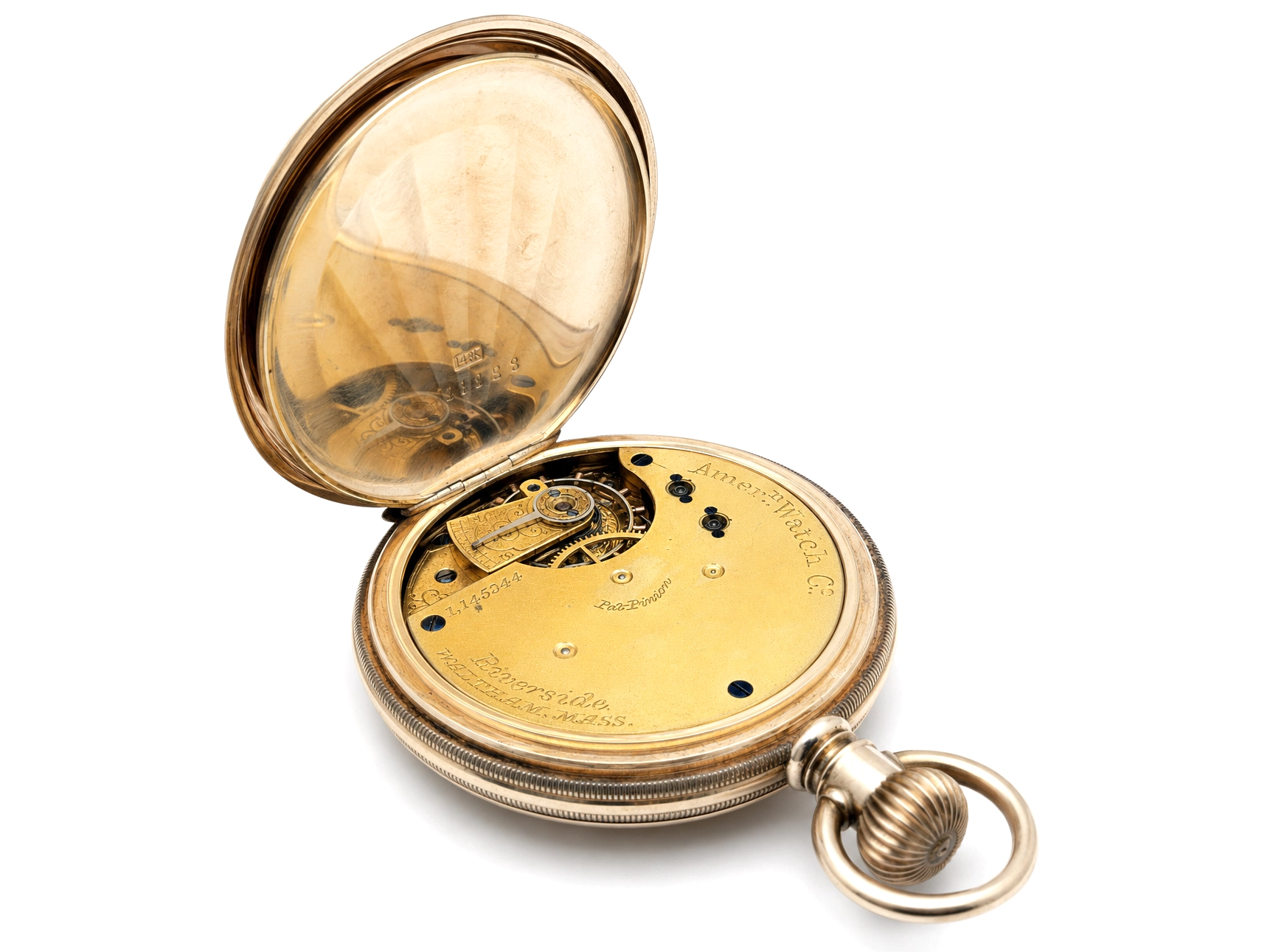 Open pocket watch case showing gilt movement with balance wheel visible and engraved backplate.