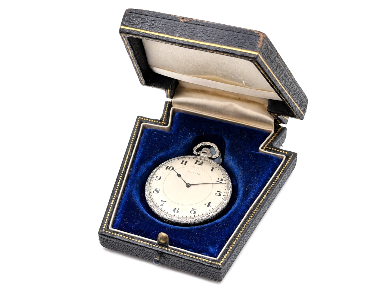 Waltham pocket watch with Arabic numerals displayed in a blue velvet leather case.