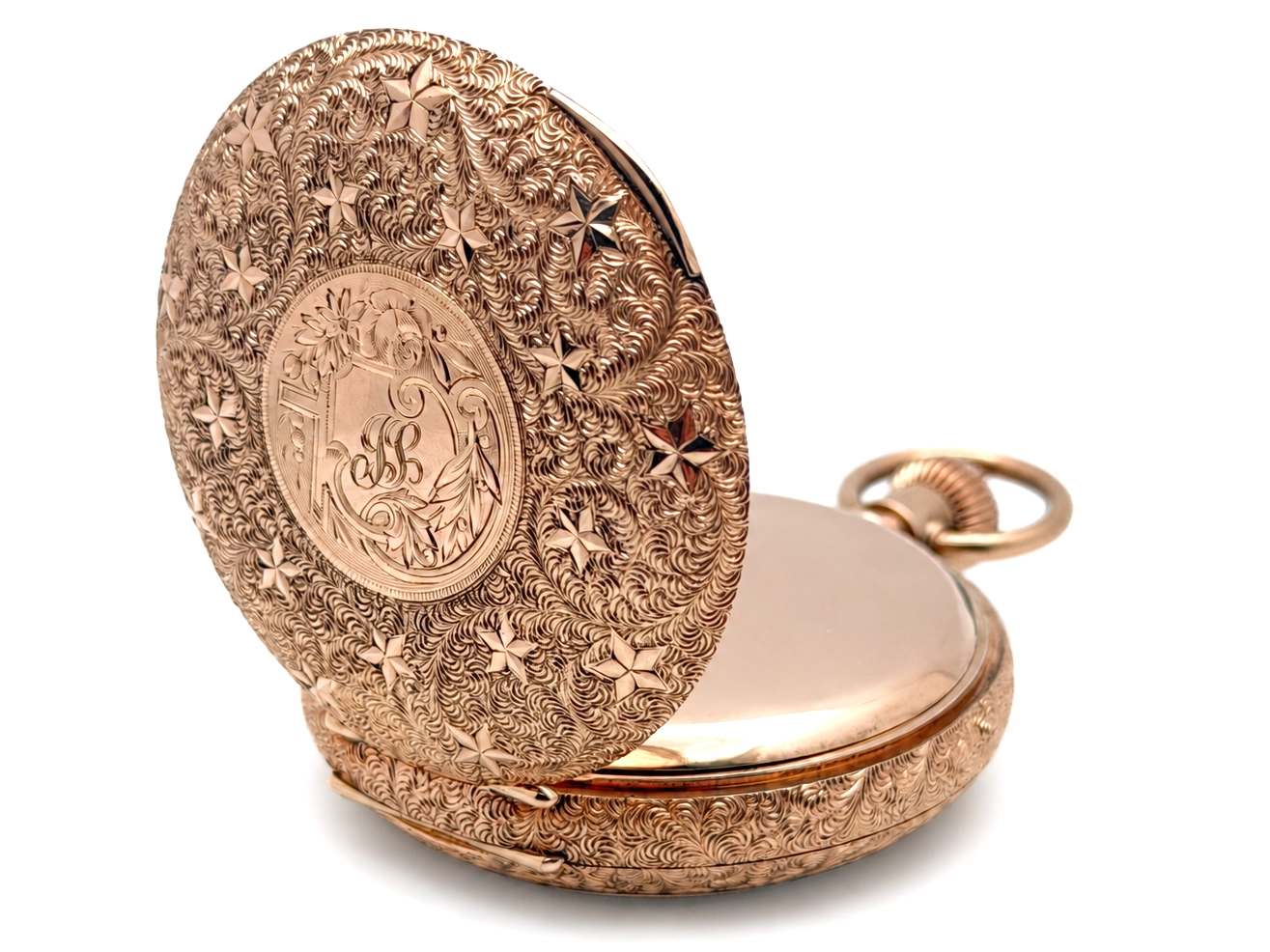 Waltham Hillside Quality Solid 14K Gold Vermicelli Case — case back cover open, showing dense ornamental engraving with fern and star…