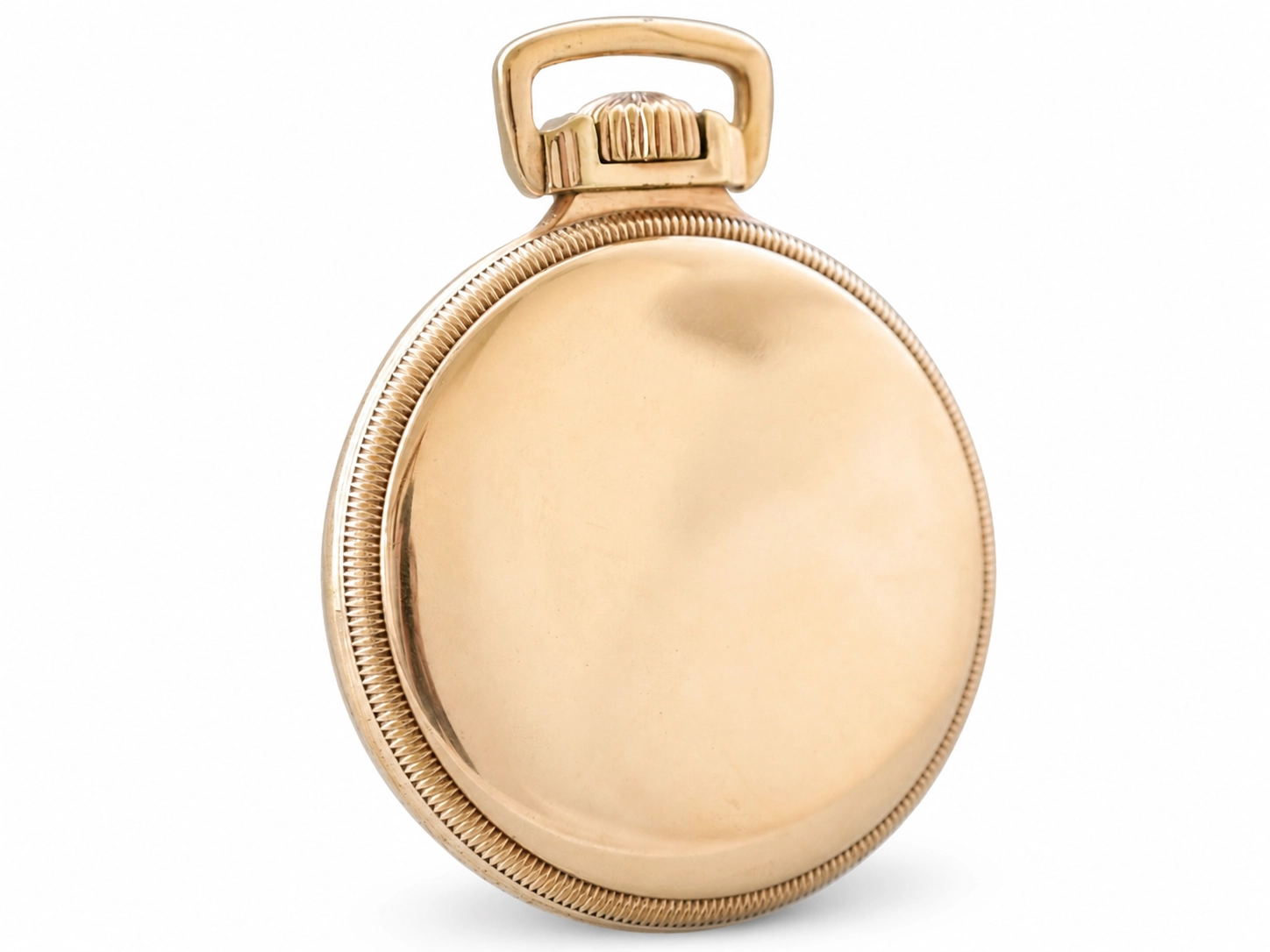 Gold pocket watch case back, polished smooth surface with rope-beaded edge and loop bail.