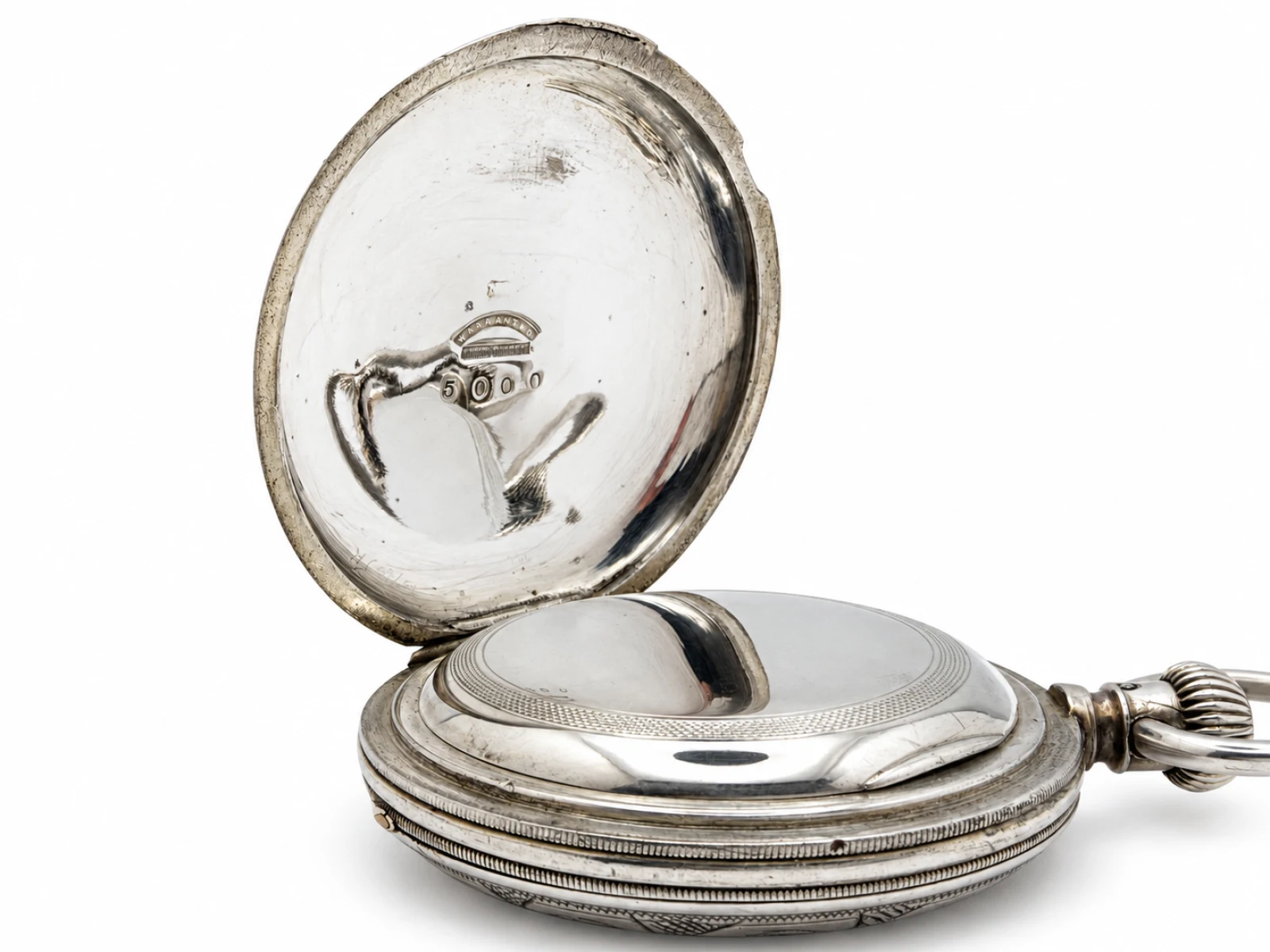 Waltham W.W.Co. Model 1857 Hunting Case (1875) — inner case back and engine-turned dust cover
