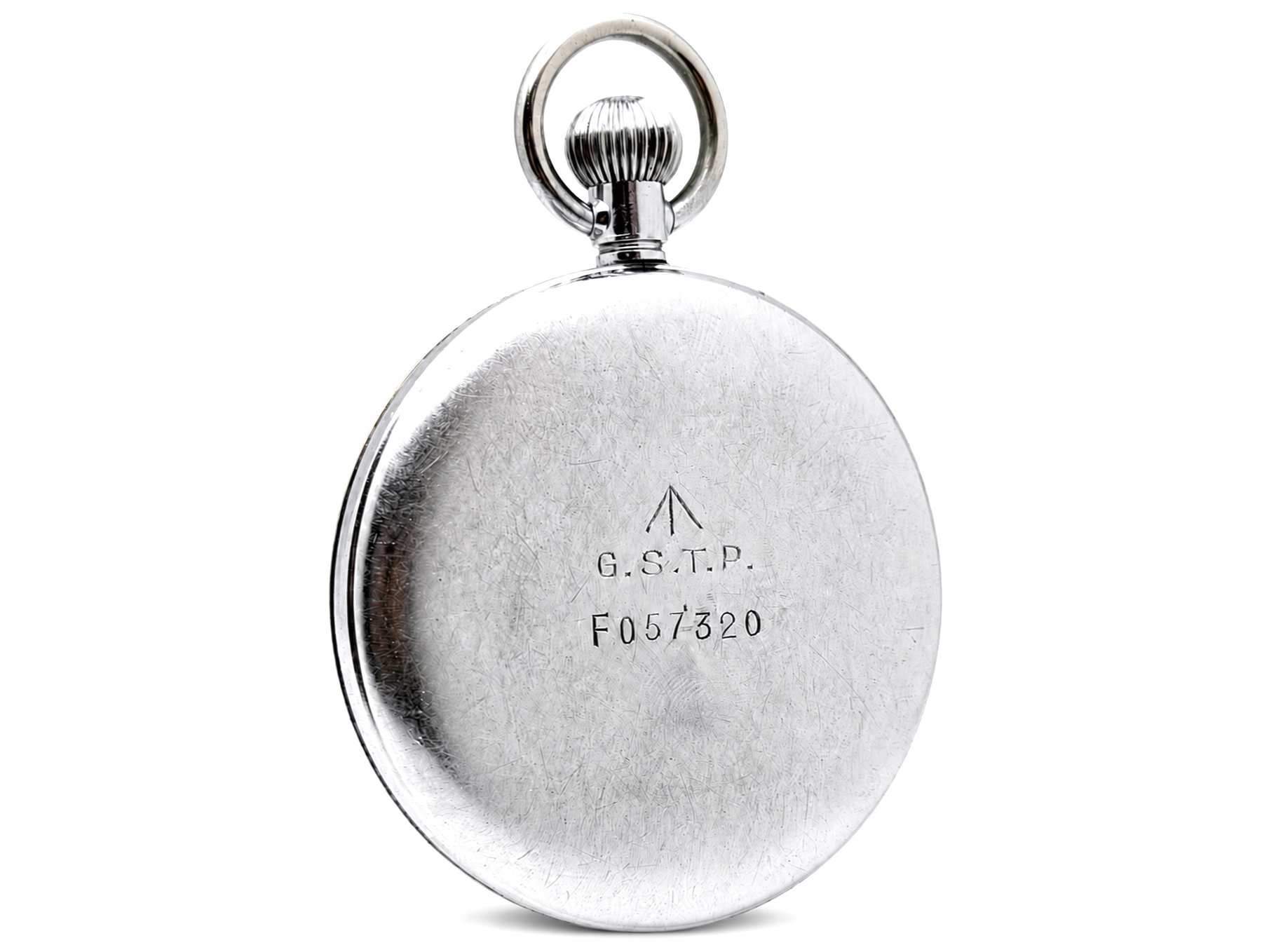 Polished silver case back with engraved G.S.T.P. monogram and serial number F057320.